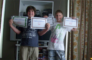 Sam and Cal with their certificates.